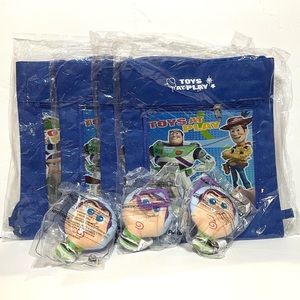 Set of 4 Toy Story Drawstring Bags and 3 Buzz light Year Clip on Plushies. NWT